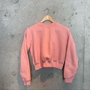 Aritzia TNA cropped pink sweater. Size XS.